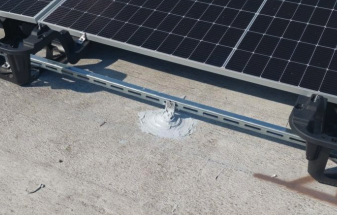 Hybrid roof attachment for lightweight commercial solar install — National Energy Installers