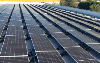 Rows of 540-watt bifacial solar panels, commercial rooftop installation — National Energy Installers