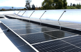 Solar panels installed following commercial roof curvature, AGI General Contracting — National Energy Installers